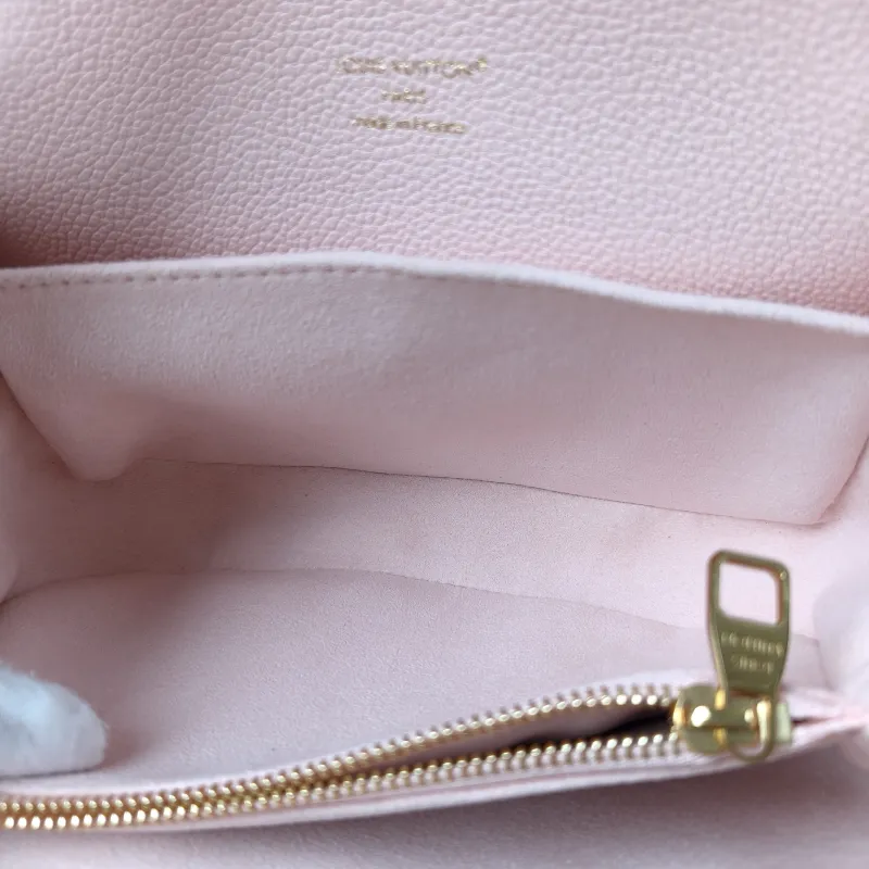 Louis Vuitton Crossbody Bag Pochette Métis East West Monogram Empreinte Embossed Calfskin Small 21.5 × 6 × 13.5 cm — detail view 12 of 14