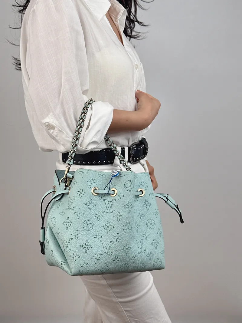 Louis Vuitton Crossbody Bag BELLA Green Calfskin 22 × 14 × 20 cm — on-model view 1 of 2