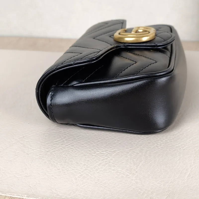 GUCCI Crossbody Bag GG Marmont Mini Marmont Mini Black with Gold-Tone Hardware Calfskinmini16.5 × 4.5 × 9.5 cm — detail view 5 of 13