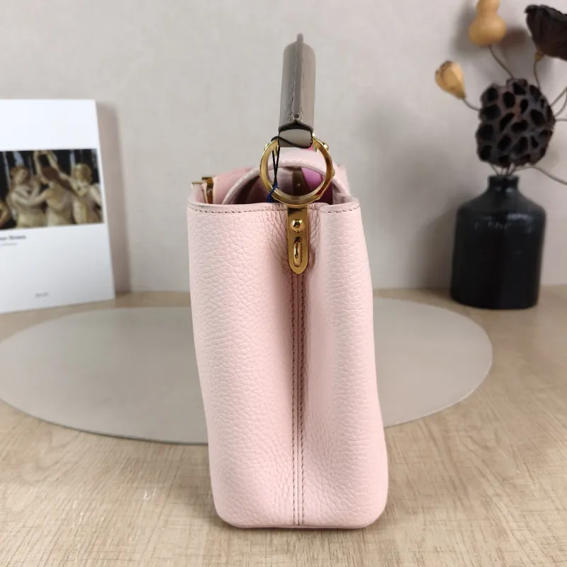 Louis Vuitton Top Handle Bag Capucines Pink Calfskin BB 27 × 9 × 17.5 cm — detail view 10 of 12