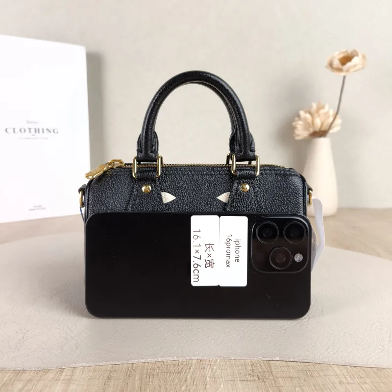 Louis Vuitton Crossbody Bag Speedy Nano Black · White Empreinte Embossed Calfskin nano 16 × 7.5 × 10 cm — cover view 2 of 6
