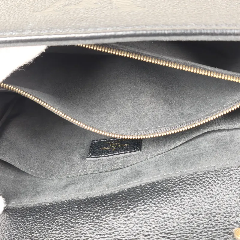 Louis Vuitton Crossbody Bag MADELEINE Black Monogram Empreinte Embossed Calfskin Medium 30 × 11 × 19.5 cm — detail view 6 of 11