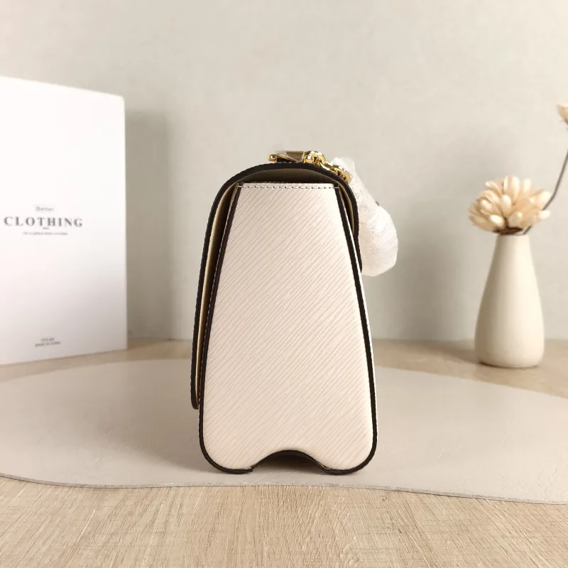Louis Vuitton Crossbody Bag Twist White Epi Embossed Calfskin Medium 23 × 9.5 × 17 cm — detail view 1 of 10