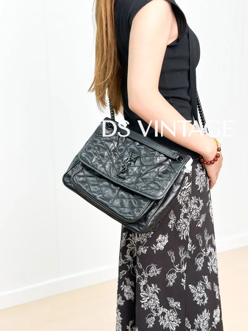 SAINT LAURENT Crossbody Bag Niki Black Waxed Leather Calfskin Medium28 × 8.5 × 20 cm — on-model view 4 of 6