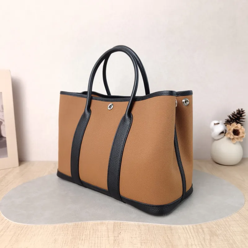 Hermès Top Handle Bag Garden Party 30 30 Brown Canvas · Negonda Calfskin Medium 30 × 13 × 21 cm B — cover view 3 of 5