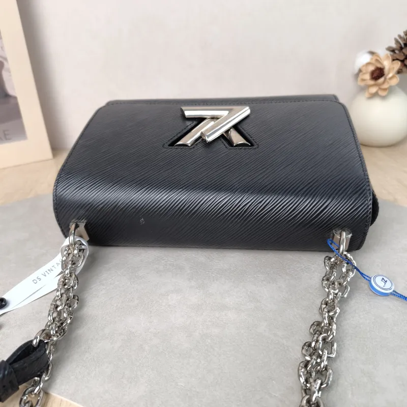 Louis Vuitton Crossbody Bag Twist Black Epi Embossed Calfskin Medium 23 × 9.5 × 17 cm — detail view 2 of 12
