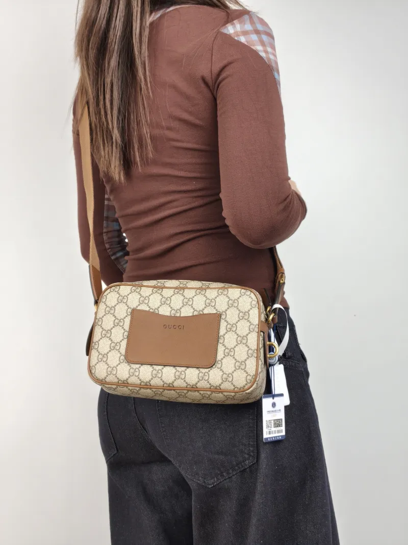 GUCCI Crossbody Bag Camera Bag Brown PVC Small 22.5 × 5.5 × 14 cm — on-model view 2 of 2