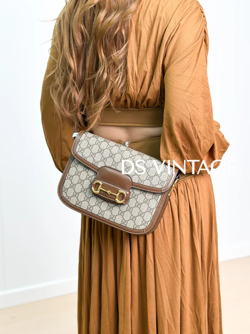 GUCCI Shoulder Bag Horsebit 1955 Horsebit Medium Monogram PVC Medium 25 × 8 × 18 cm — on-model view 1 of 3