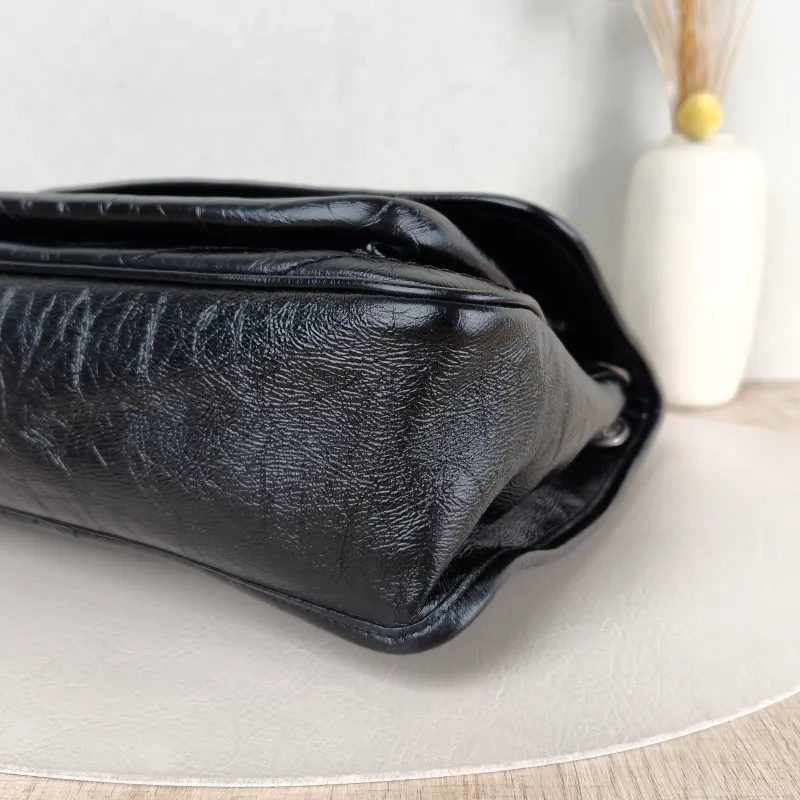 SAINT LAURENT Crossbody Bag Niki D Waxed Leather Calfskin Medium 28 × 8.5 × 20 cm — detail view 9 of 13
