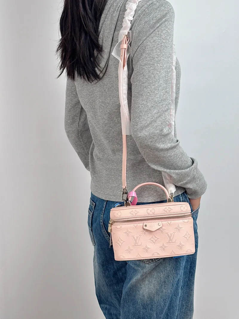 Louis Vuitton Shoulder Bag VANITY POUCH Cosmetic Bag Pink Calfskin One Size 19 × 6.5 × 11.5 cm — on-model view 3 of 3