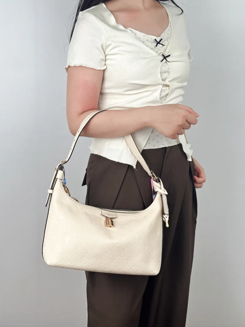 Louis Vuitton Shoulder Bag SAC SPORT Shoulder Bag White Calfskin One Size27 × 10.5 × 22 cm — on-model view 1 of 2