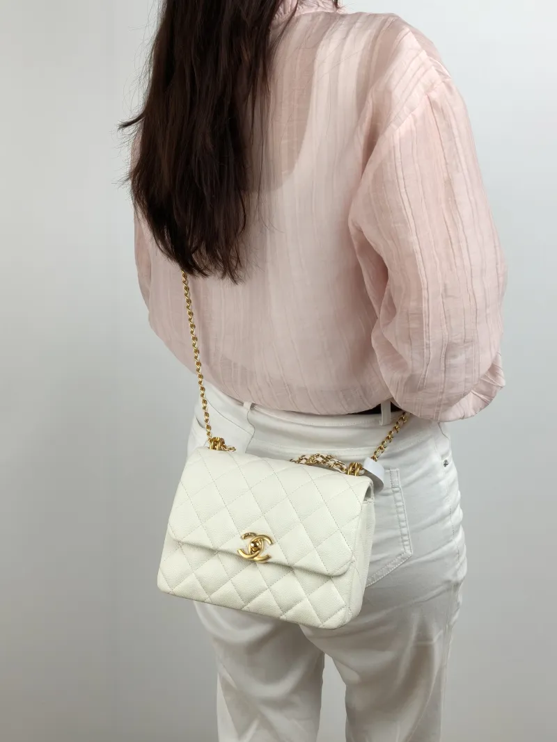 Chanel Crossbody Bag 22k White Grained Calfskin Small Edition 20 × 8.5 × 14.5 cm — on-model view 1 of 2