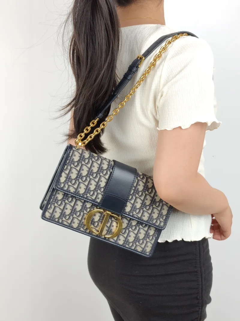 DIOR Crossbody Bag 30Montaigne 30 Edition Canvas Medium 25 × 9 × 16.5 cm — on-model view 1 of 3