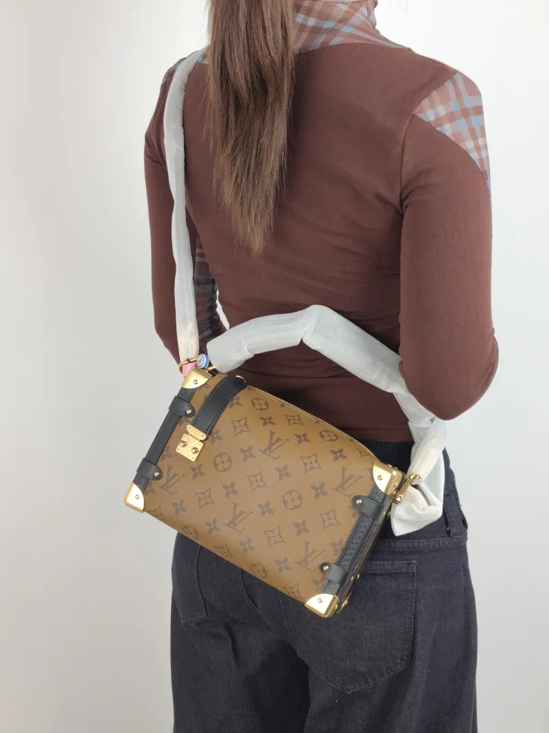 Louis Vuitton Crossbody Bag Side Trunk Box Monogram PVC Medium 23.5 × 8.5 × 16 cm — on-model view 2 of 3