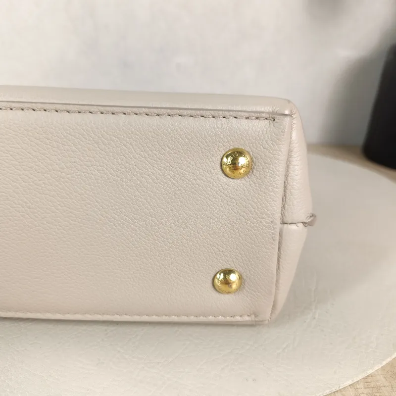 Louis Vuitton Crossbody Bag Lockme Ever Top Handle Bag Calfskin Mini 23 × 10 × 17 cm — detail view 10 of 13