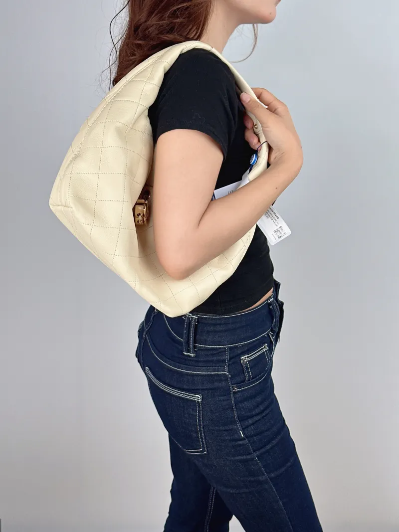 Chanel Crossbody Bag 26c hobo Beige Calfskin One Size 32 × 12 × 24 cm — on-model view 2 of 2