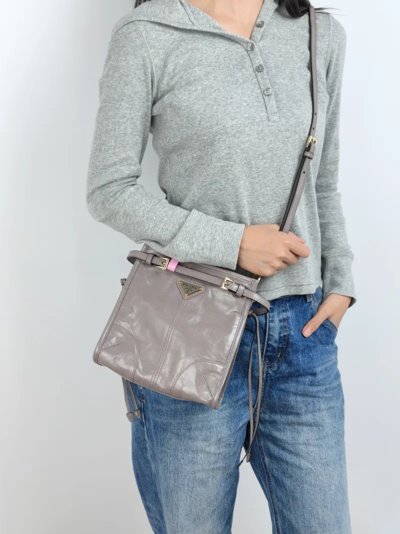 PRADA Shoulder Bag Bonnie Shoulder Bag Grey Waxed Leather Calfskin Mini 19.5 × 7 × 20 cm — on-model view 2 of 2