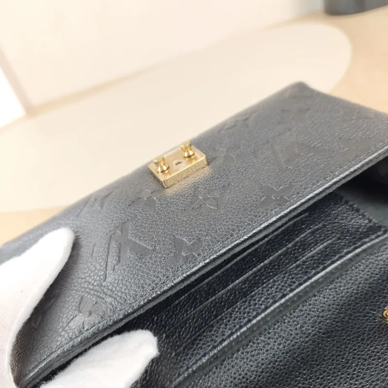 Louis Vuitton Crossbody Bag MADELEINE Black Monogram Empreinte Embossed Calfskin nano 21 × 6 × 12.5 cm — detail view 2 of 14