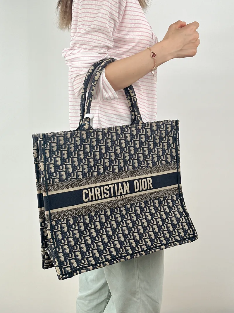 DIOR Top Handle Bag Book Tote Blue Canvas Large42 × 18.5 × 35 cm — on-model view 1 of 2