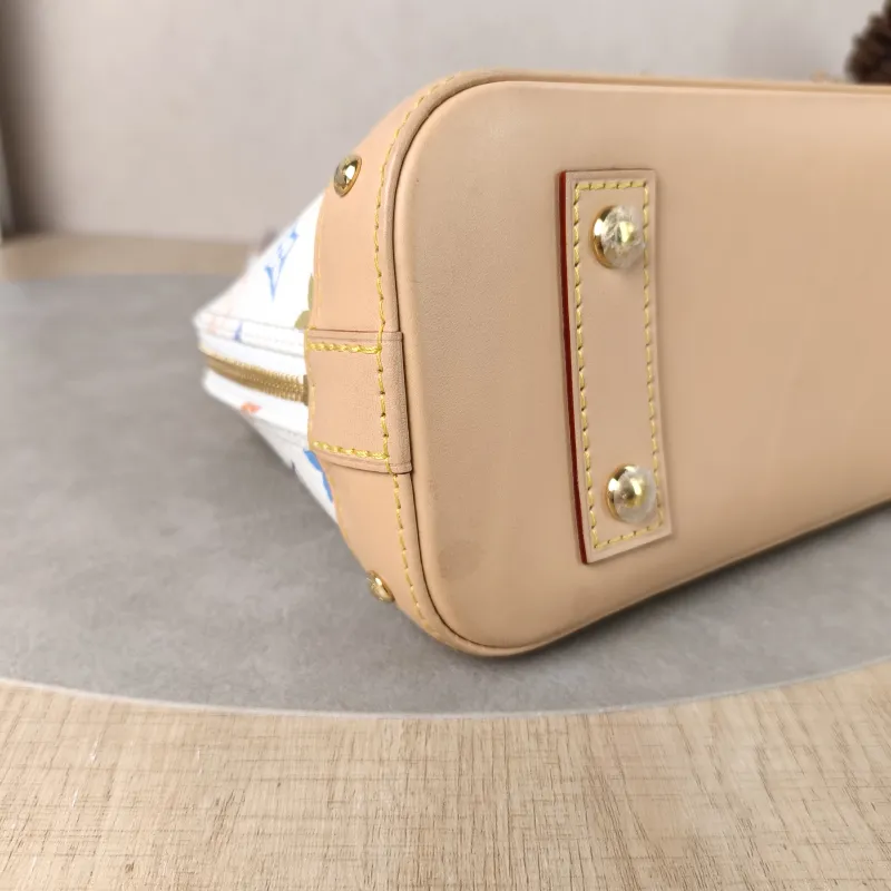Louis Vuitton Crossbody Bag Alma BB Multicolore PVCBB23.5 × 11.5 × 17.5 cm — detail view 8 of 13