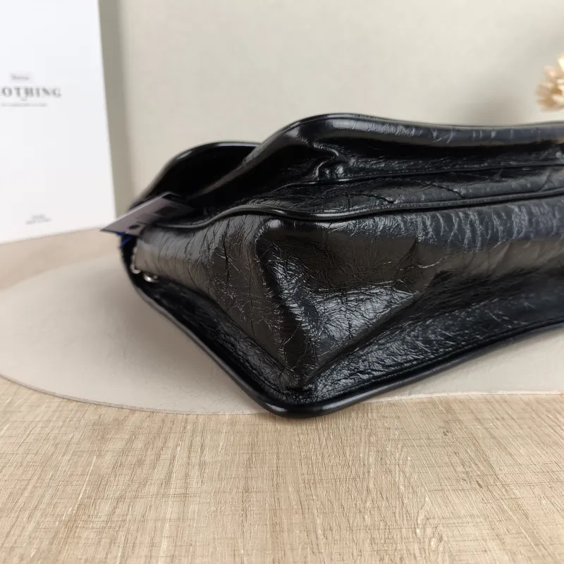 SAINT LAURENT Crossbody Bag Niki D Waxed Leather Calfskin Medium 28 × 8.5 × 20 cm — detail view 10 of 14