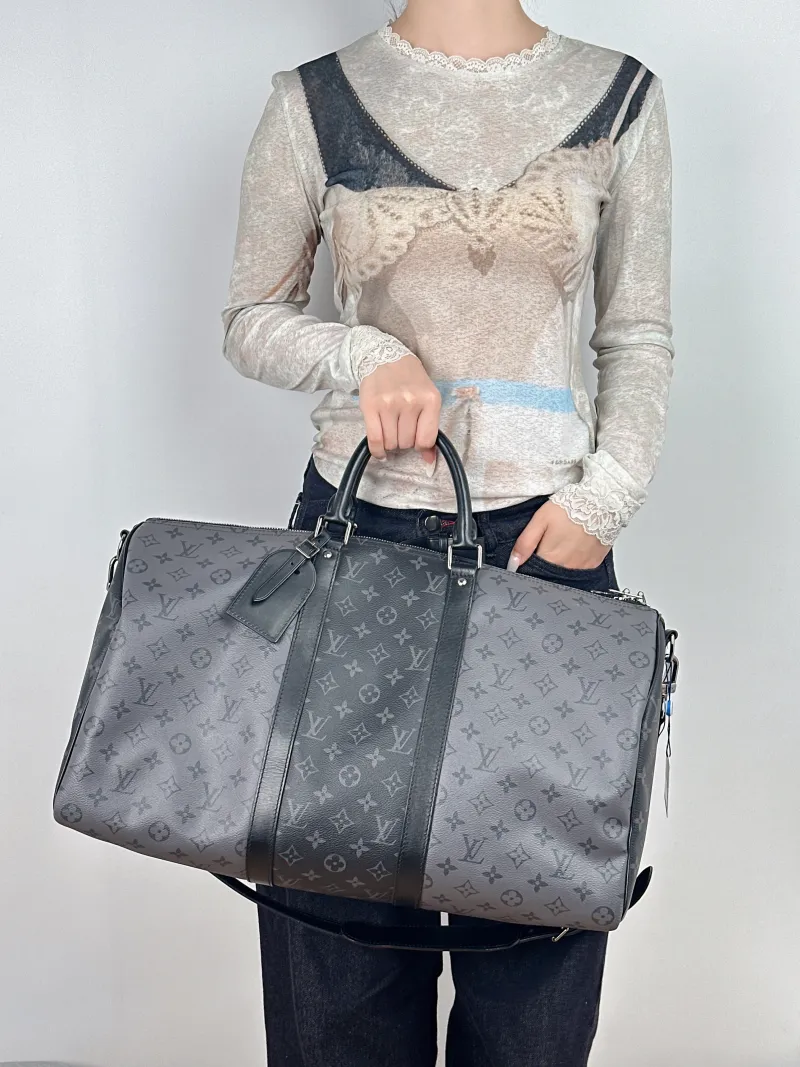Louis Vuitton Crossbody Bag Keepall 50 Shoulder Strap Edition Black · Grey PVC One Size50 × 23 × 29 cm — on-model view 1 of 2