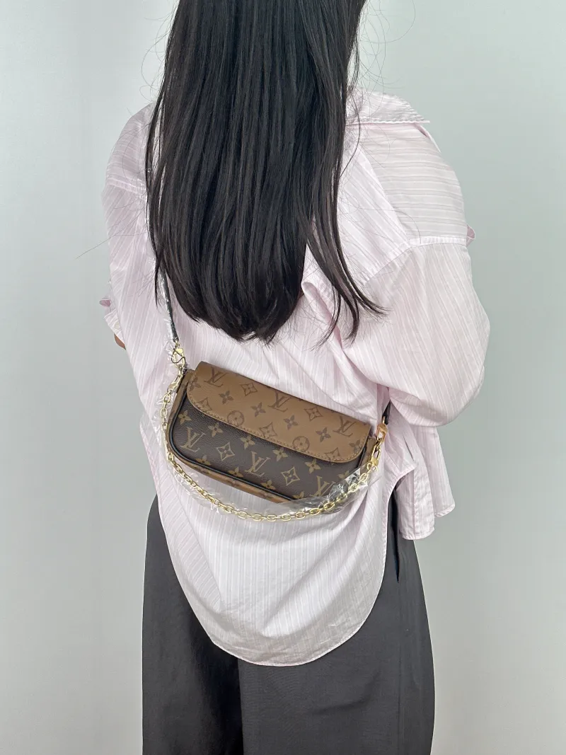 Louis Vuitton Crossbody Bag IVY Monogram PVC Small 23.5 × 4.3 × 12 cm — on-model view 2 of 2