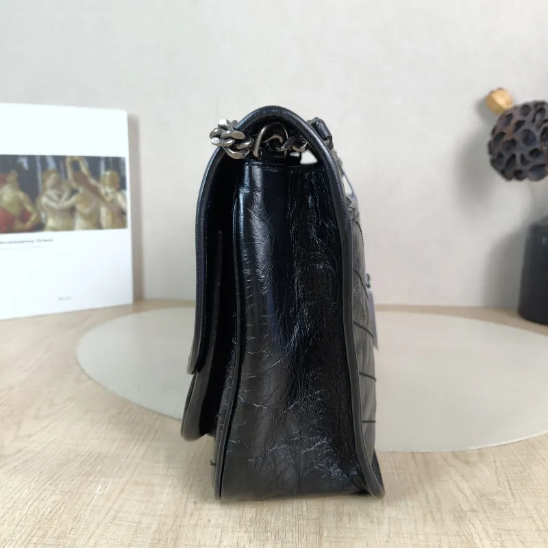 SAINT LAURENT Crossbody Bag Niki D Waxed Leather Calfskin Medium 28 × 8.5 × 20 cm — detail view 10 of 12