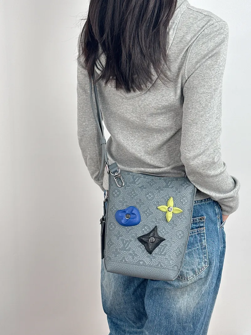 Louis Vuitton Shoulder Bag Hobo Cruiser Grey Calfskin Small 17 × 8.5 × 24 cm — on-model view 1 of 2