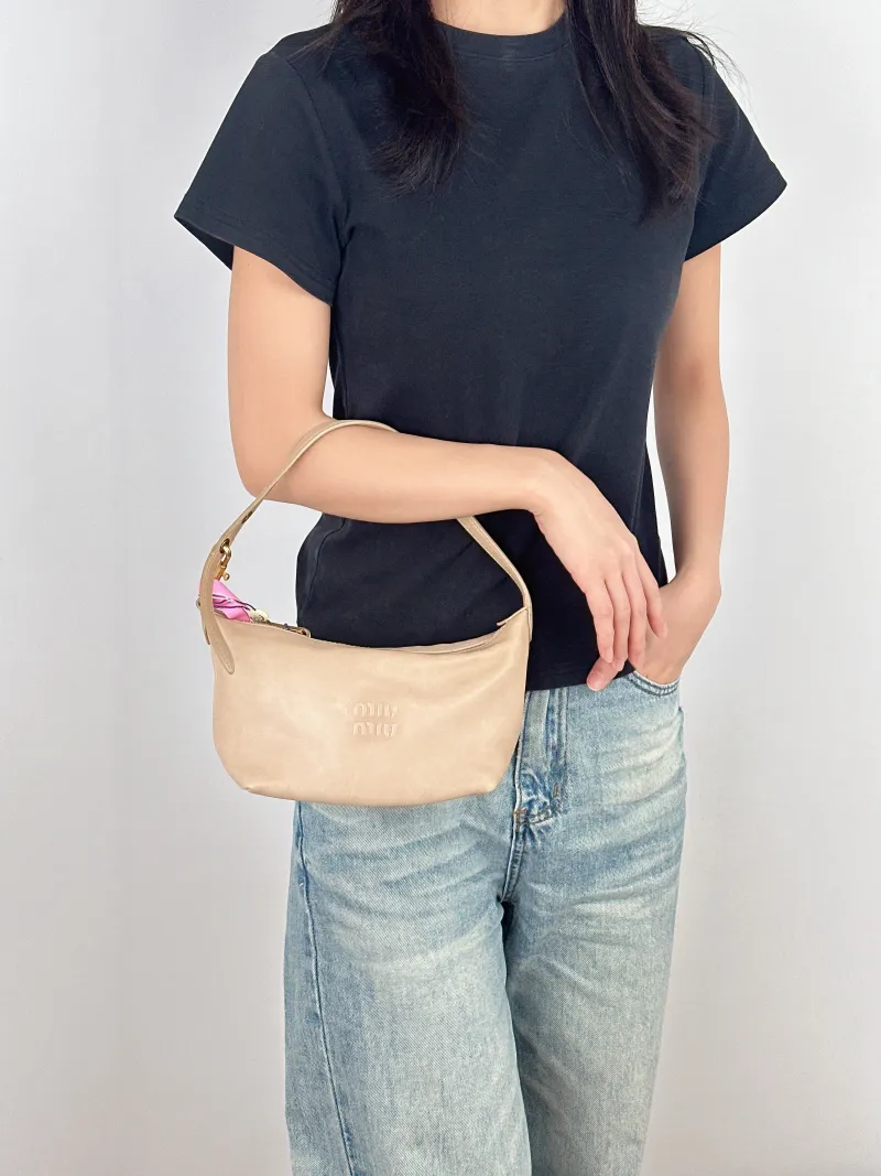 Miumiu Top Handle Bag Spirit Vanity Case Bag Cosmetic Bag Lambskin One Size18.5 × 10 × 14 cm — on-model view 2 of 3