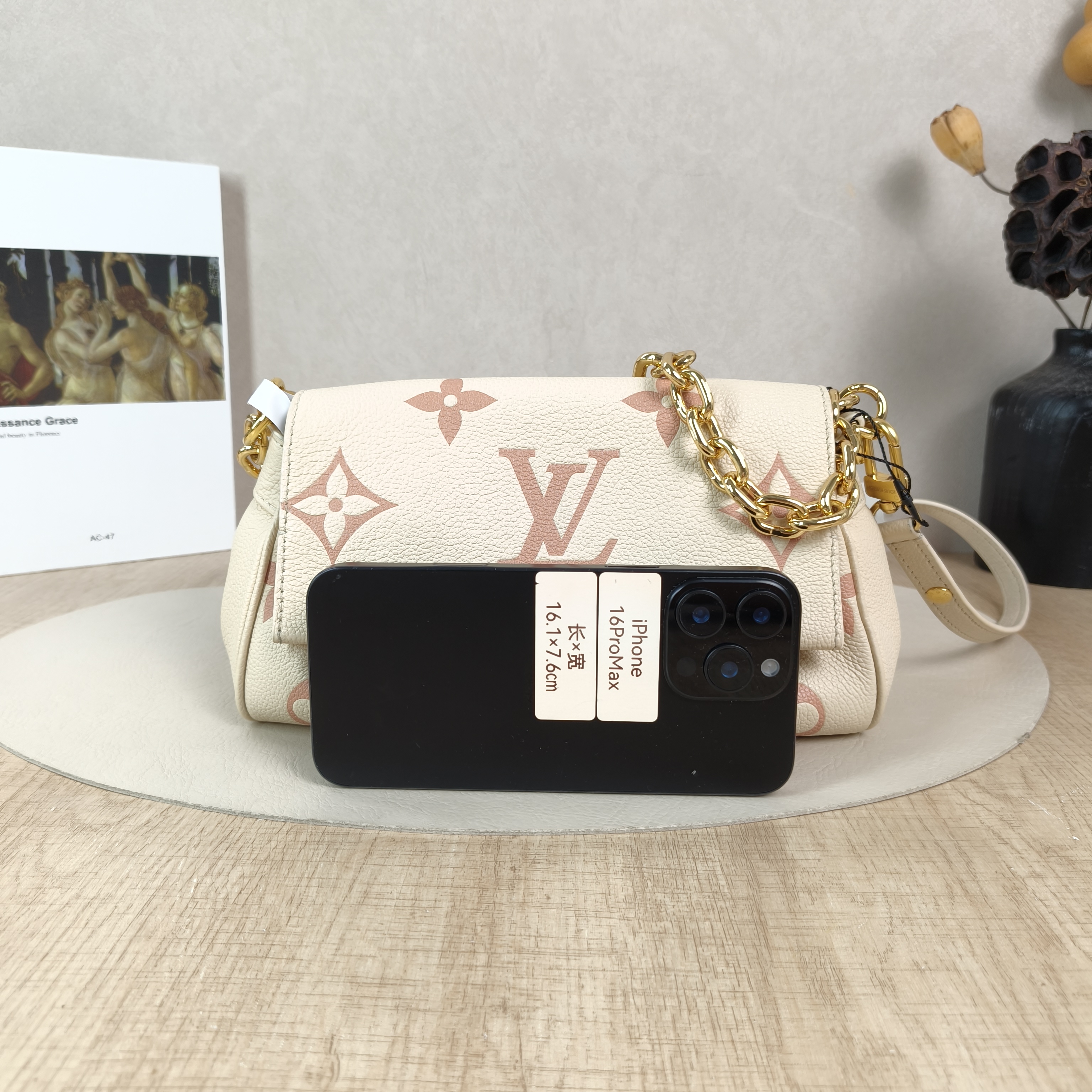 Louis Vuitton Crossbody Bag Favorite White · Pink Empreinte Embossed Calfskin Medium24 × 9 × 14 cm — cover view 5 of 6