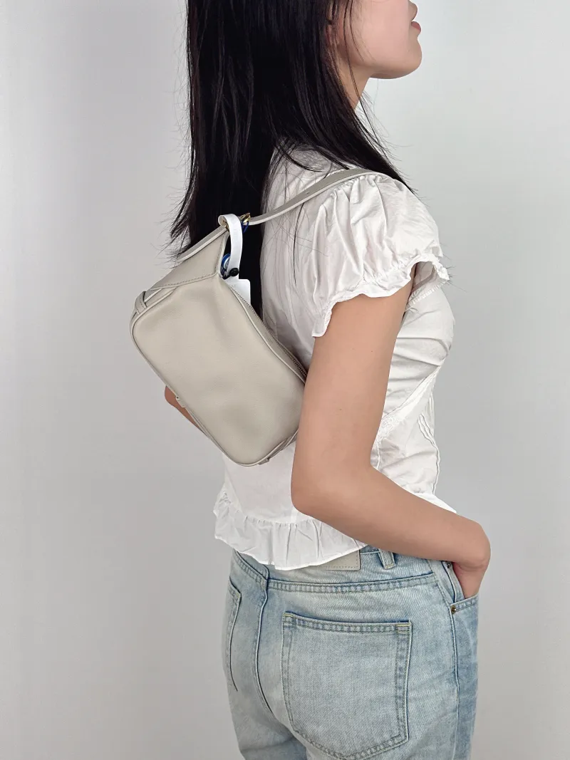 CELINE Shoulder Bag Romy Hobo Shoulder Bag White CC alfskin Small 20 × 5.5 × 15 cm — on-model view 2 of 2