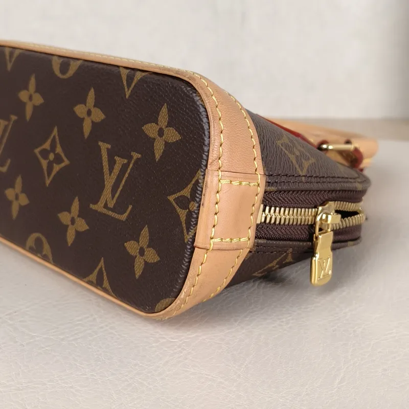Louis Vuitton Crossbody Bag Alma Nano Monogram PVC nano 18 × 8 × 12 cm — detail view 8 of 9