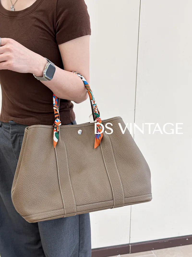 Hermès Top Handle Bag Garden Party 36 36 Negonda Calfskin Large 36 × 17 × 26 cm U — on-model view 1 of 3
