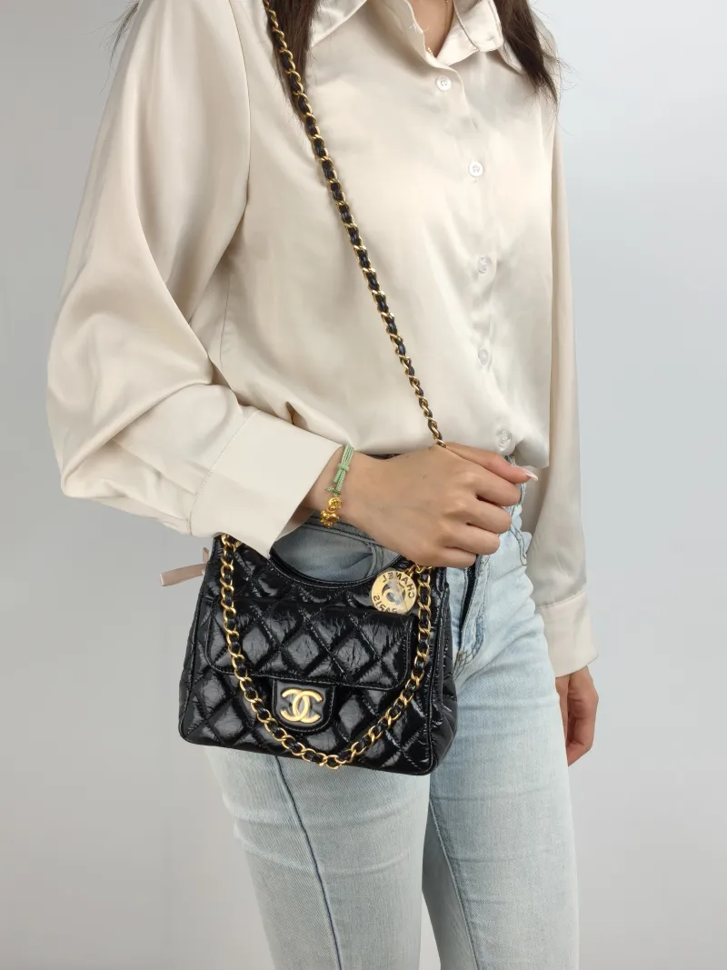 Chanel Crossbody Bag HOBO Black Waxed Leather Calfskin Small 19 × 6 × 17 cm — on-model view 2 of 2
