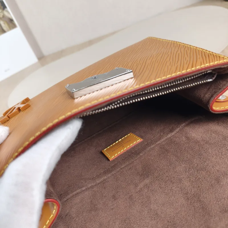 Louis Vuitton Crossbody Bag CLUNY Yellow Epi Embossed Calfskin Mini 20 × 7.5 × 16 cm Leather Tag — detail view 8 of 14
