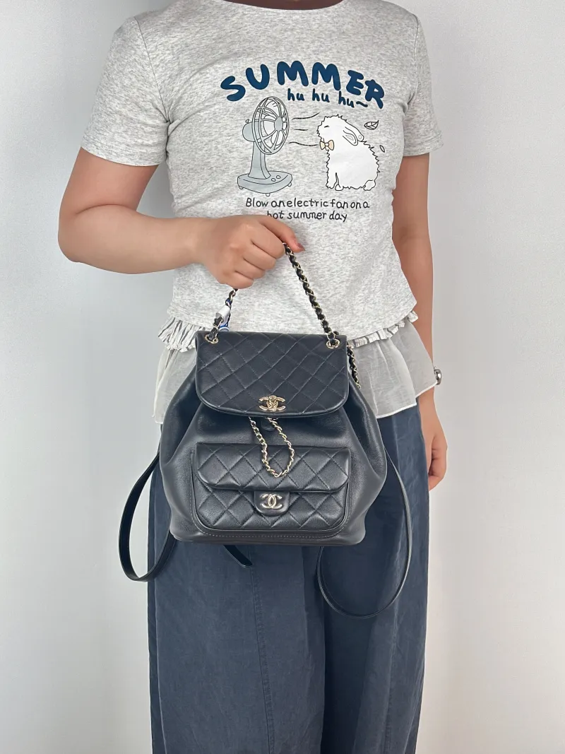 Chanel Backpack Duma Black Grained Calfskin Large21 × 13 × 23 cm — on-model view 2 of 3