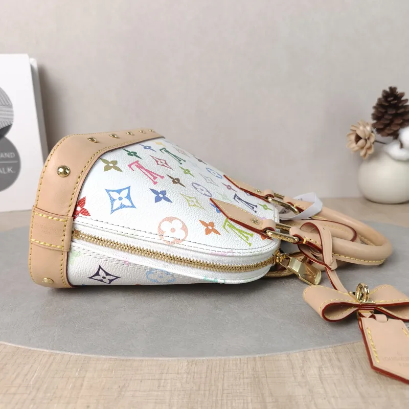 Louis Vuitton Crossbody Bag Alma BB Multicolore PVCBB23.5 × 11.5 × 17.5 cm — detail view 13 of 13