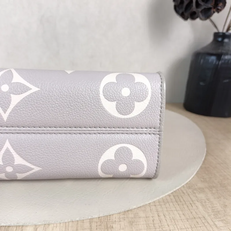 Louis Vuitton Crossbody Bag Onthego East West Two Straps Grey Monogram Empreinte Embossed Calfskin Small 25 × 10 × 13 cm — detail view 8 of 12