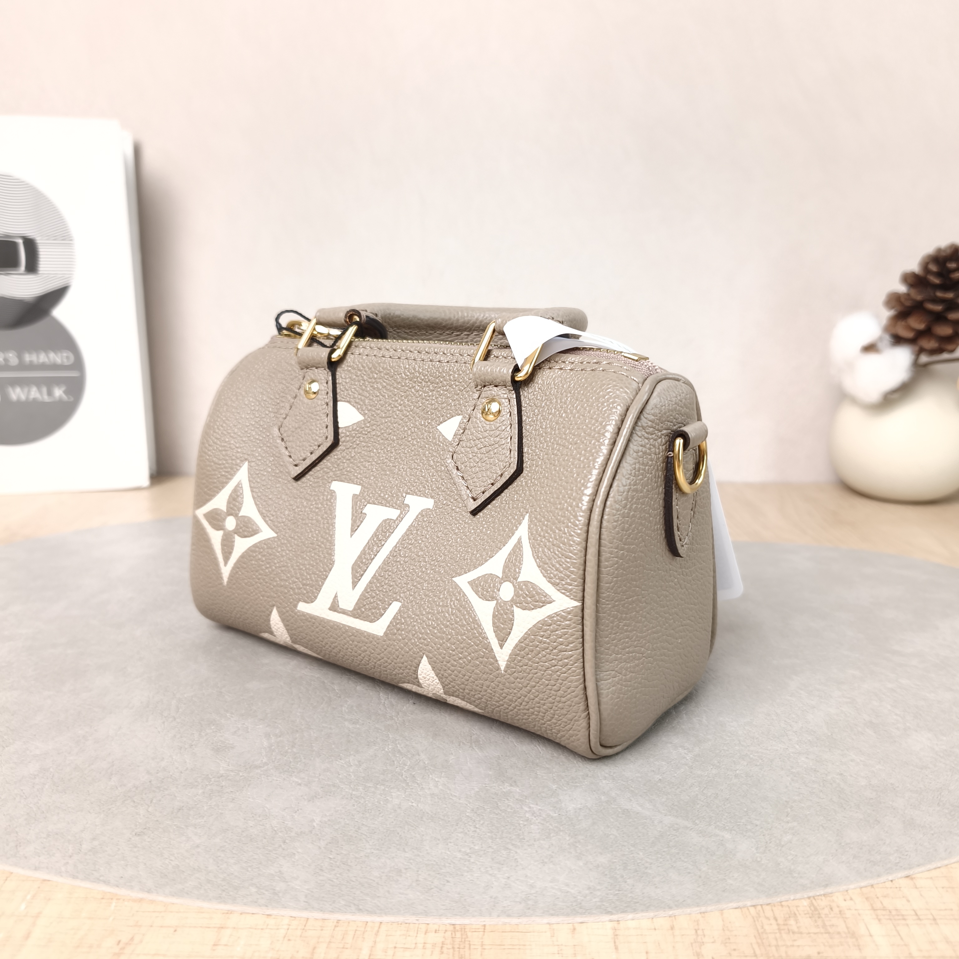 Louis Vuitton Crossbody Bag Speedy Nano · White Empreinte Embossed Calfskin Monogramnano16 × 7.5 × 10 cm — cover view 5 of 5