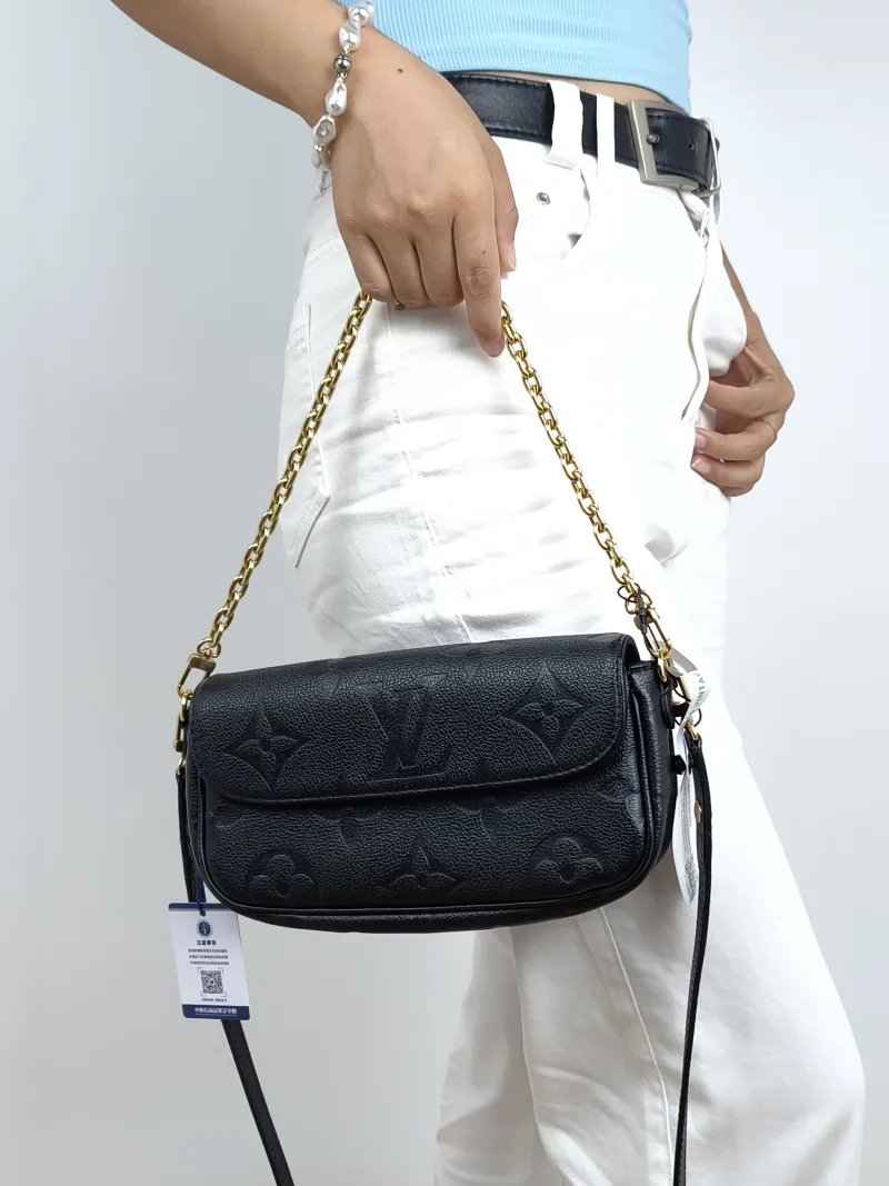 Louis Vuitton Crossbody Bag IVY Black Empreinte Embossed Calfskin Small23.5 × 4.3 × 12 cm — on-model view 1 of 3