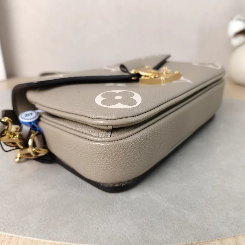 Louis Vuitton Crossbody Bag Pochette Métis East West Empreinte Embossed Calfskin Small21.5 × 6 × 13.5 cm — detail view 1 of 14