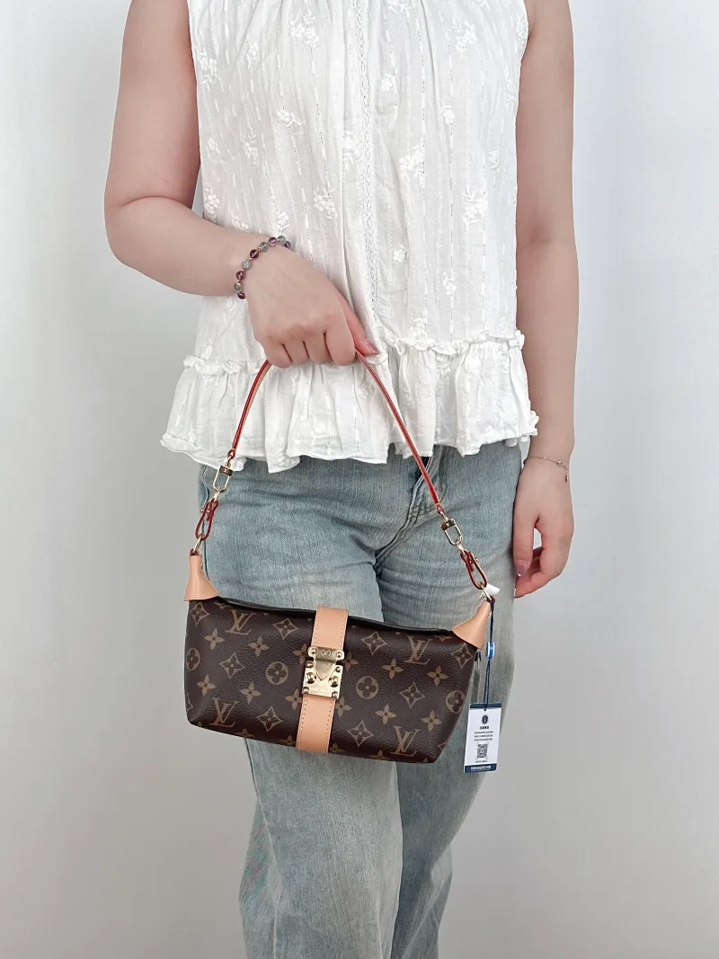 Louis Vuitton Shoulder Bag Pochette Mia Monogram PVC One Size22 × 8 × 14.5 cm — on-model view 1 of 2