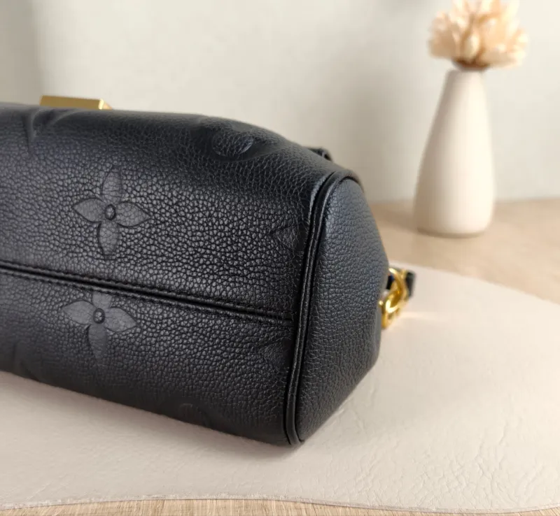 Louis Vuitton Crossbody Bag Favorite Black Monogram Empreinte Embossed Calfskin Medium 24 × 9 × 14 cm — detail view 3 of 10