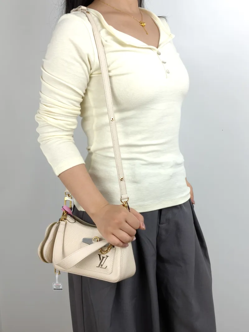 Louis Vuitton Shoulder Bag MARELLINI White Epi Embossed Calfskin Mini 19 × 6.5 × 13.5 cm — on-model view 1 of 3