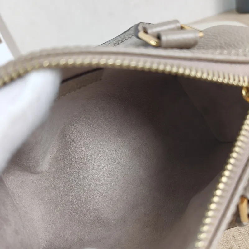 Louis Vuitton Crossbody Bag Speedy Nano · White Monogram Empreinte Embossed Calfskin nano 16 × 7.5 × 10 cm — detail view 10 of 11