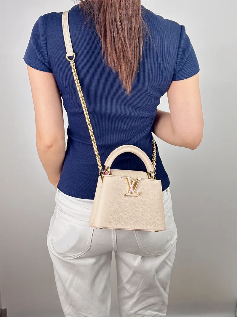 Louis Vuitton Shoulder Bag Capucines Beige Calfskin Mini 21 × 8 × 14 cm — on-model view 2 of 3