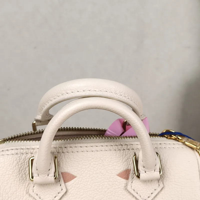 Louis Vuitton Crossbody Bag Speedy Nano White · Pink Empreinte Embossed Calfskin nano 16 × 7.5 × 10 cm — detail view 9 of 10