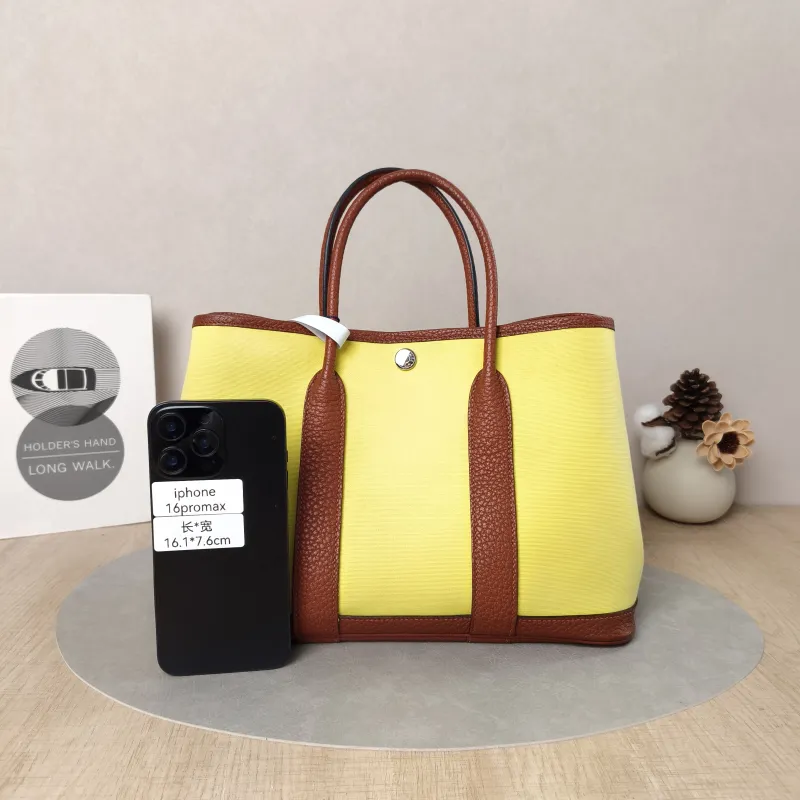 Hermès Top Handle Bag Garden Party 30 30 Canvas · Negonda Calfskin Medium30 × 13 × 21 cm — cover view 5 of 5