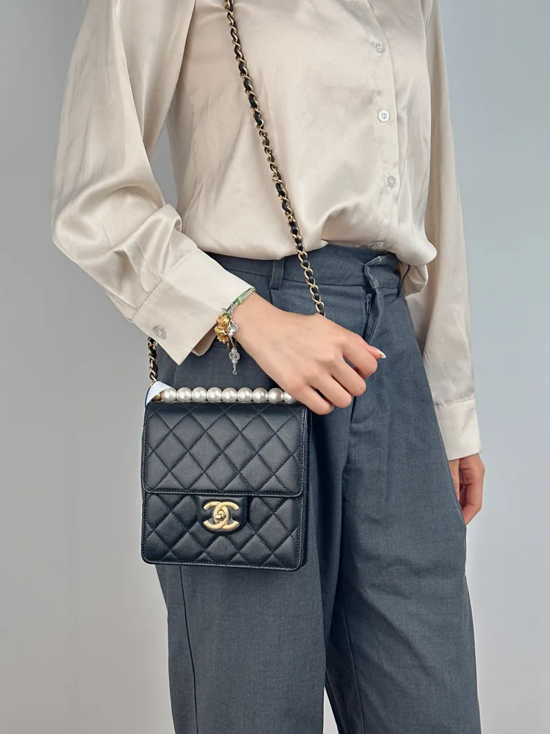 Chanel Crossbody Bag Pearl Crossbody Bag Black Calfskin One Size 15.5 × 5 × 15.5 cm 29 — on-model view 1 of 2